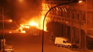 A view shows vehicles on fire outside Splendid Hotel in Ouagadougou, Burkina Faso in this still image taken from a video January 15, 2016, during a siege by Islamist gunmen.  REUTERS/Reuters TV