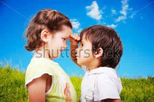 stock-photo-two-cute-children-male-and-female-comparing-their-height-37341079