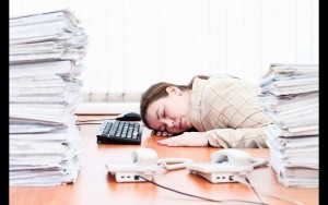 Woman-Sleeping-At-Desk_BORDERS